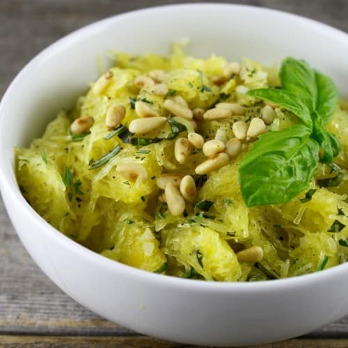 A white bowl of Spaghetti Squash with Garlic and Herbs