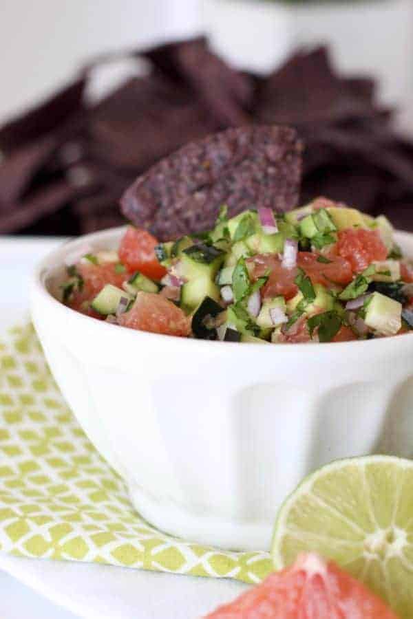 Close up view of a bowl of grapefruit avocado salsa