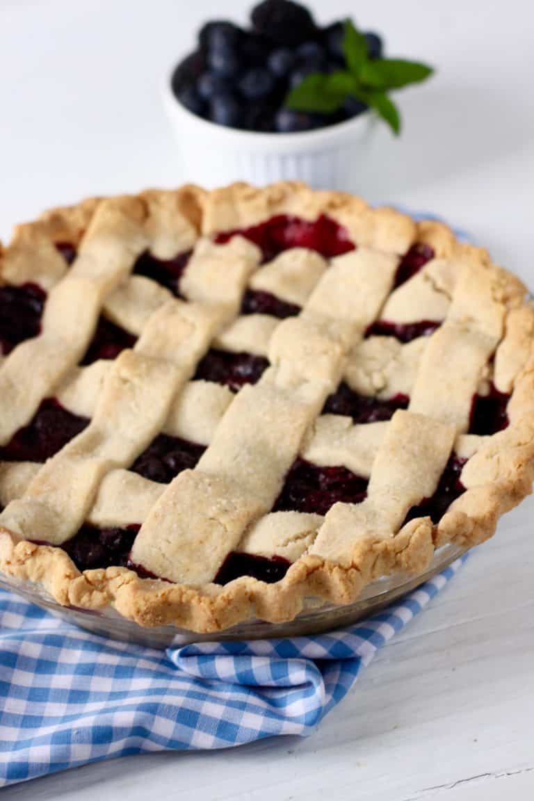 Overhead view of a blueberry pie with a lattice-style topping.