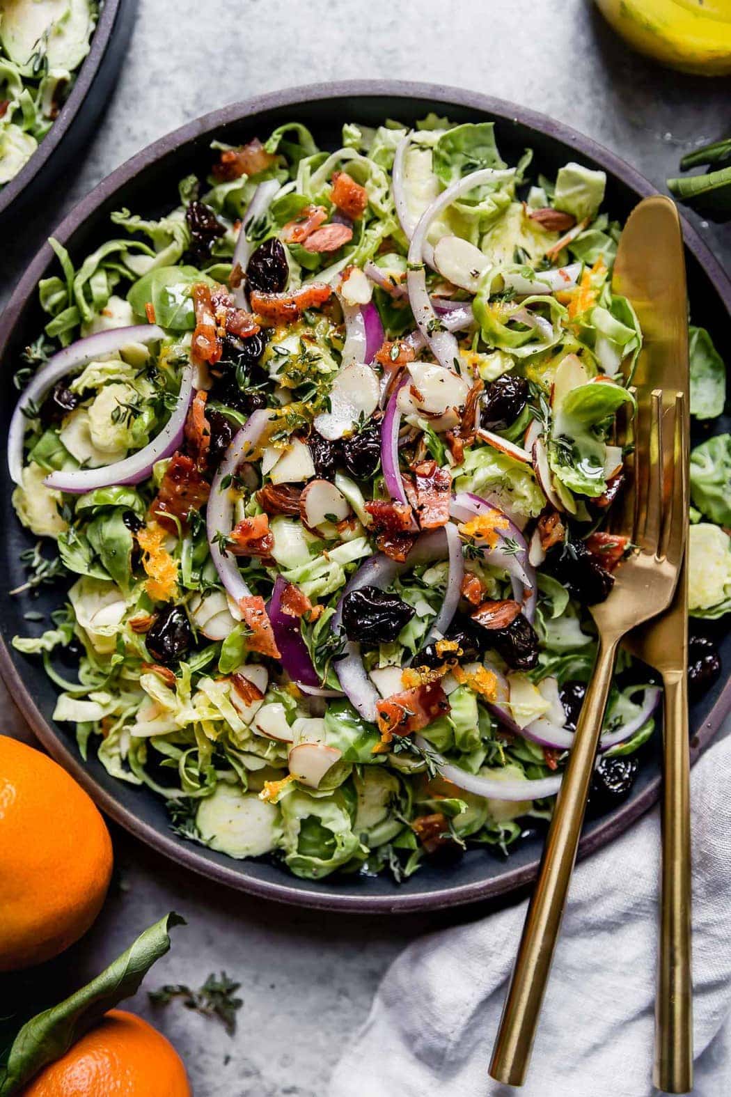 Overhead view of a bowl of Brussels Sprouts Salad with Citrus Vinaigrette