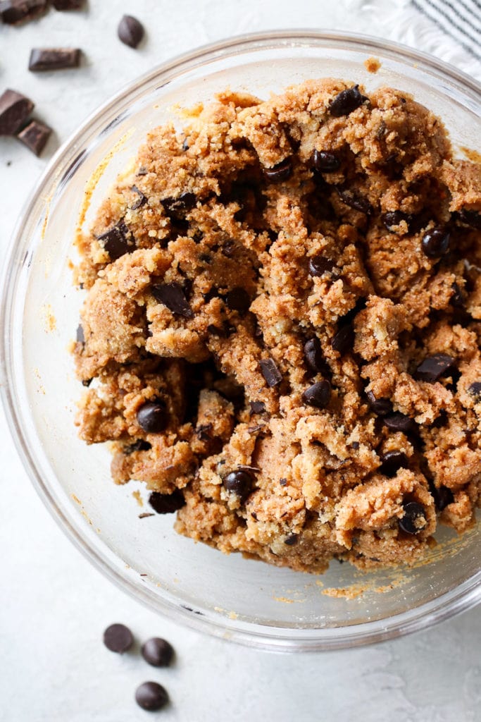 Ingredients for the Paleo Chocolate Chip Cookies in a bowl all mixed together.