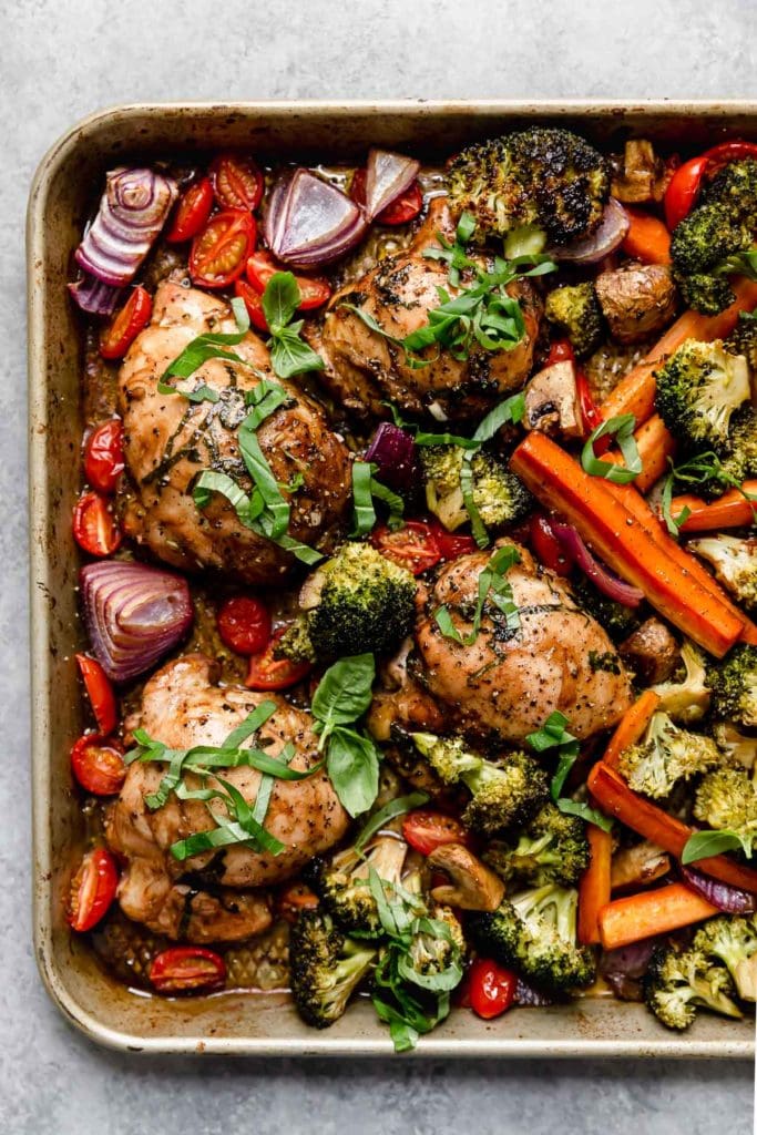 One pan balsamic chicken and veggie bake on a sheet pan