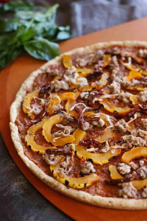 Grain-free Pizza with Sausage and Roasted Squash | healthy pizza recipes | homemade pizza recipes | gluten-free pizza | egg-free pizza | paleo pizza | dairy-free pizza | fall inspired recipes | roasted squash recipes || The Real Food Dietitians #healthypizza #paleopizza #grainfreepizza