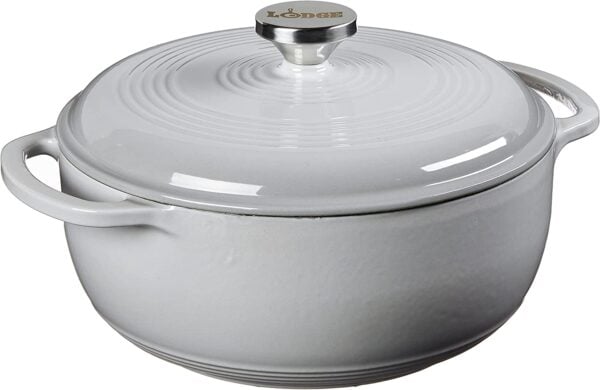 A white cast iron dutch oven