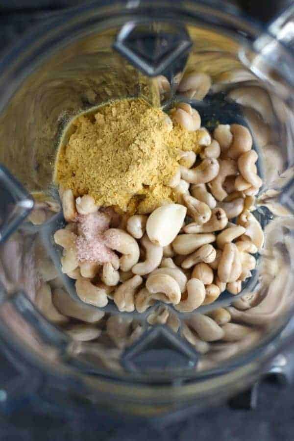 Overhead view of Dairy-Free Alfredo sauce ingredients in a blender