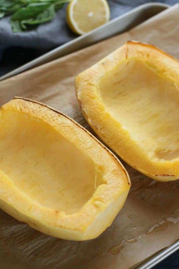 spaghetti squash on a sheet pan freshly roasted 