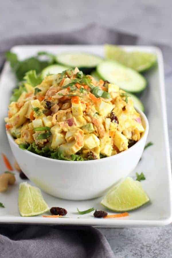 A white bowl filled with Curry Egg Salad