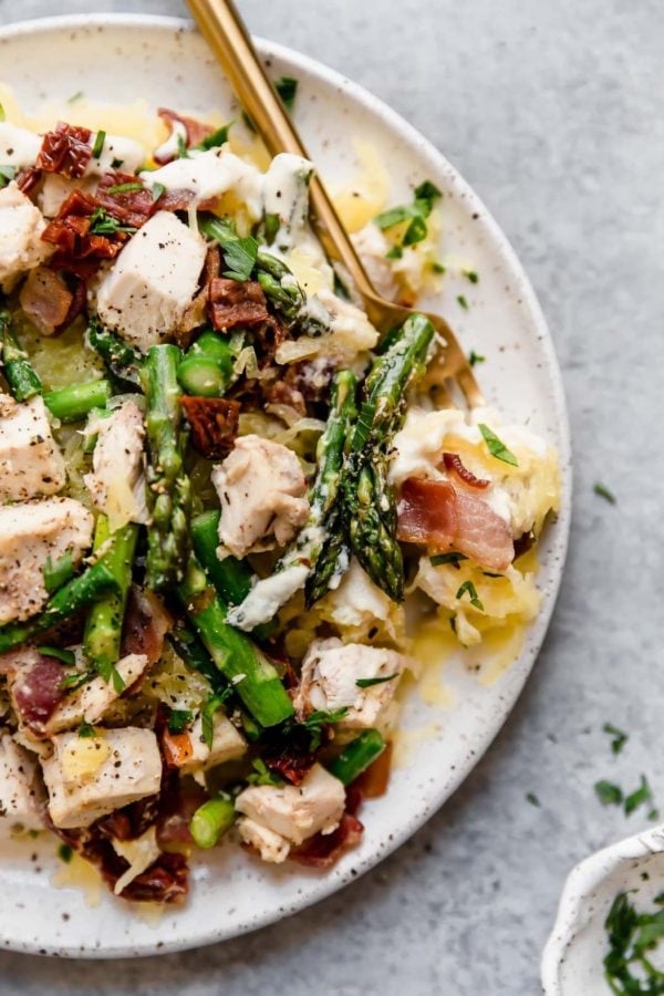 Close up view of Creamy Chicken Spaghetti Squash with Bacon and Asparagus