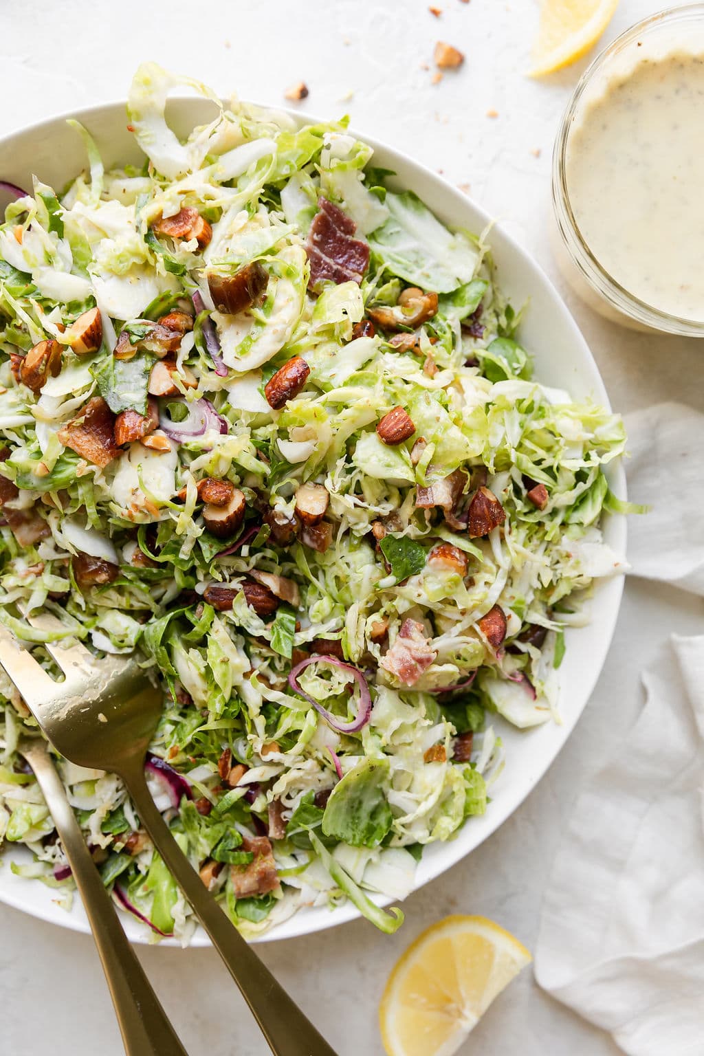 Overhead view of a bowl of Sweet and Smoky Shredded Brussels Sprouts Slaw