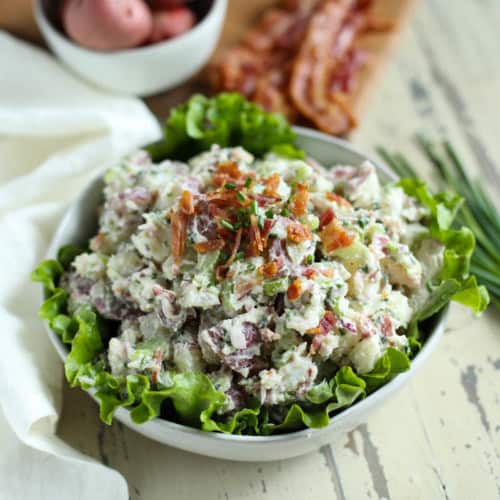 An overhead view of a bowl of Bacon Chive Potato Salad