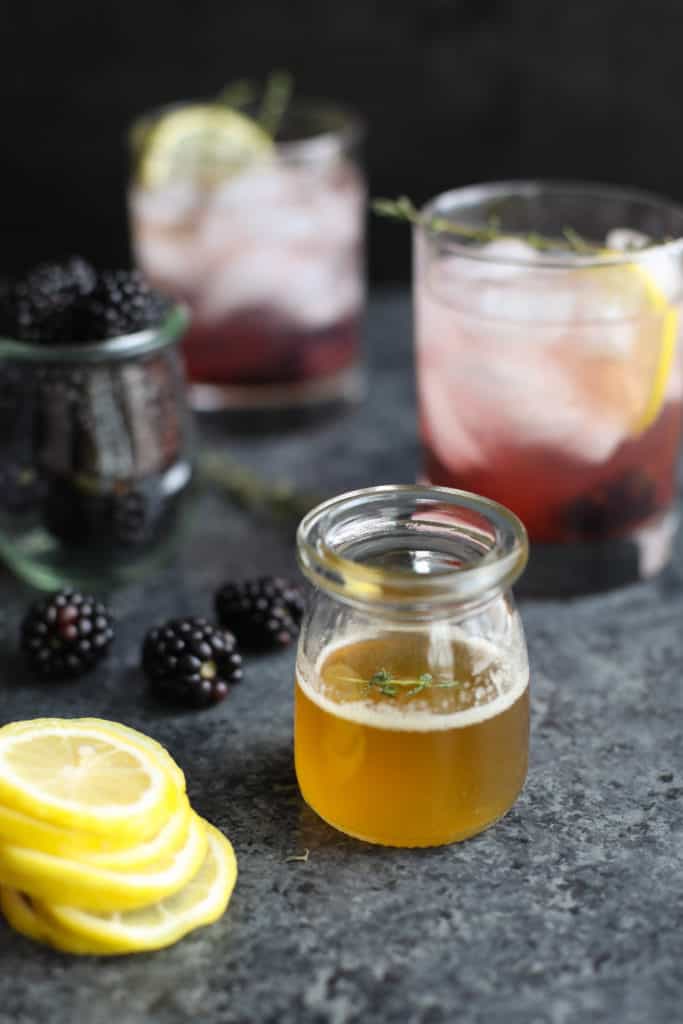 Close up view of Blackberry Lemon Thyme Sparklers ingredients