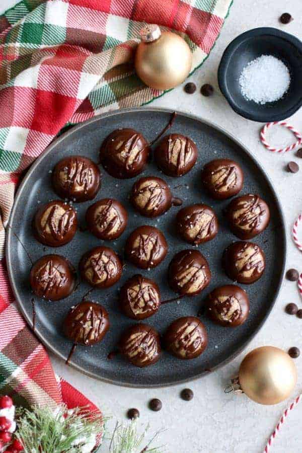 Overhead view of Healthy Buckeyes (Peanut Butter Balls) on a gray tray