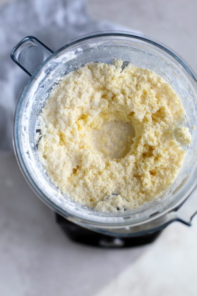 Overhead view of a blender filled with butter