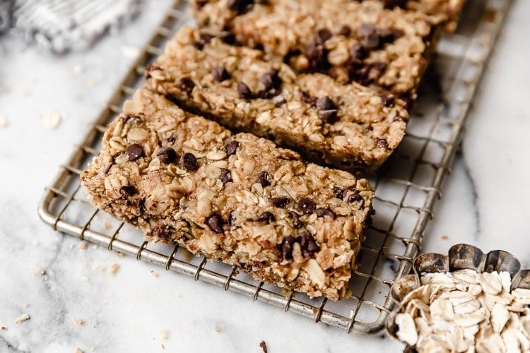 row of healthy granola bars arranged on wire cooling rack