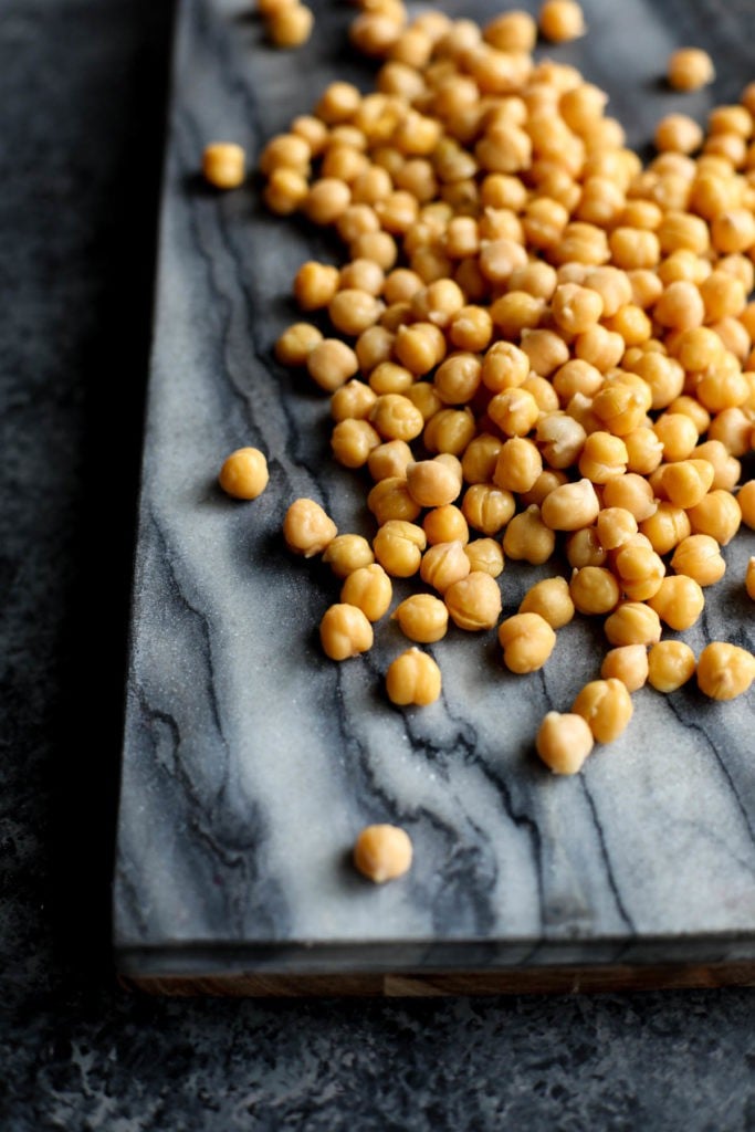 Chickpeas on a marble cutting board