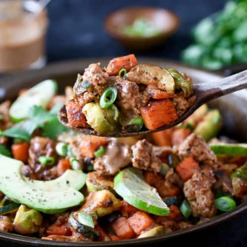 BBQ Ranch turkey skillet on a plate with sliced avocado
