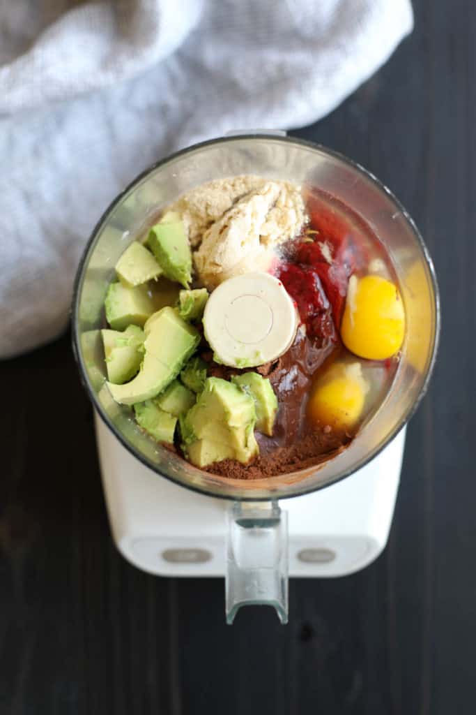 Overhead view of a food processor filled with Paleo Double Chocolate Beet Brownie ingredients