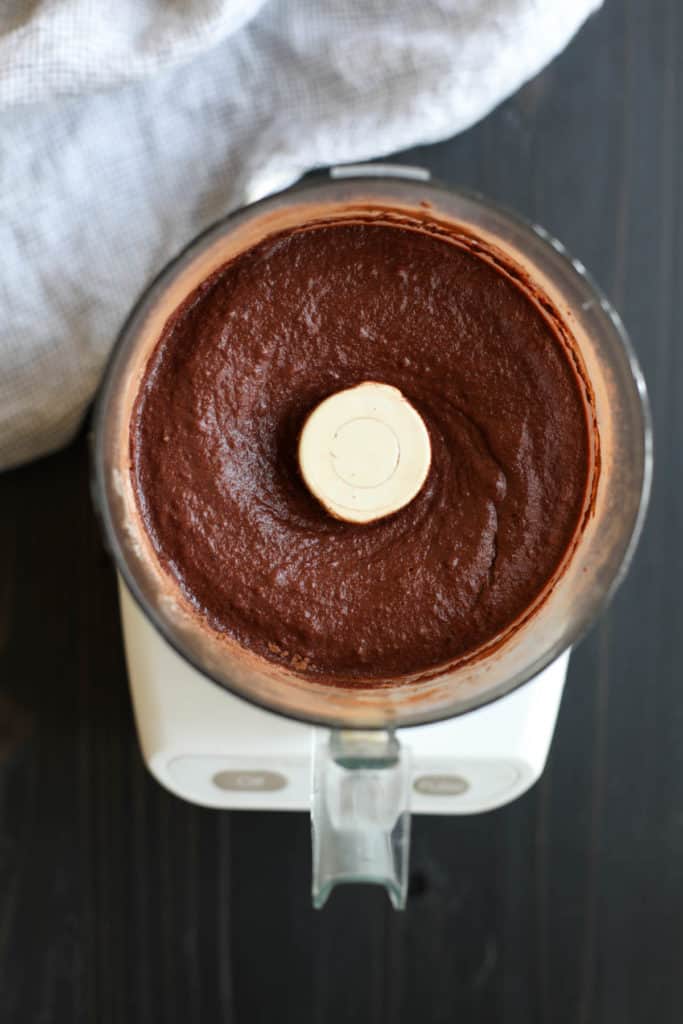 Overhead view of a food processor filled with Paleo Double Chocolate Beet Brownie batter