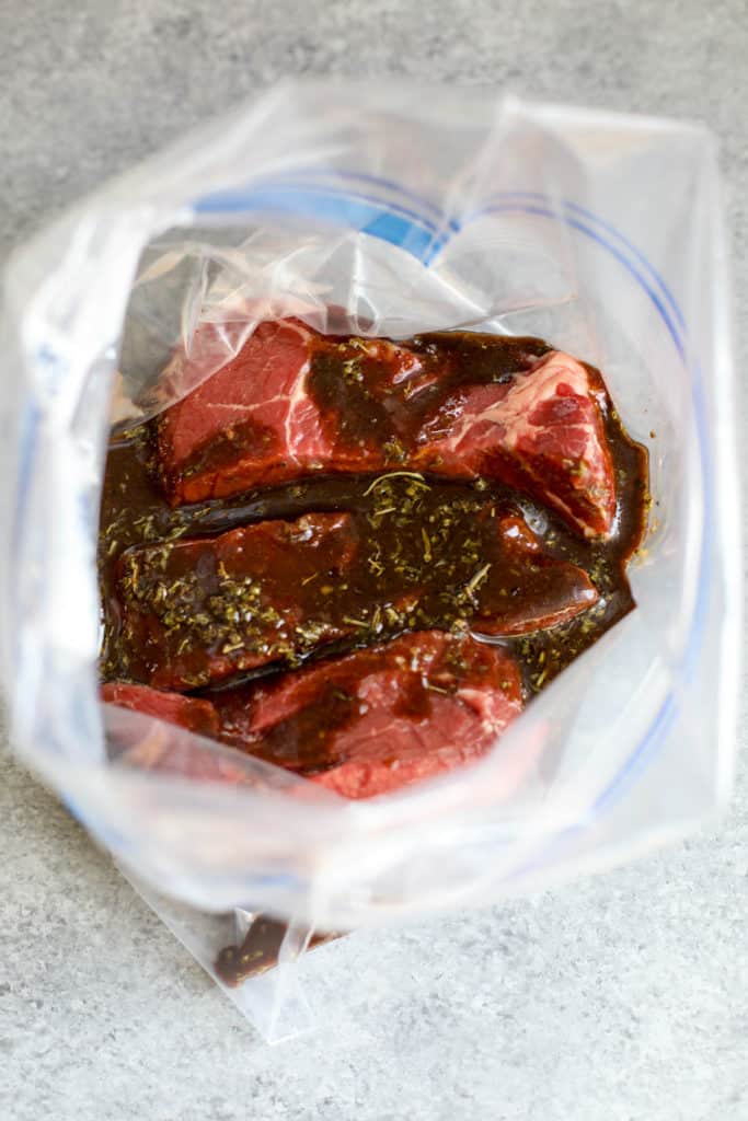 process shot of steak marinading