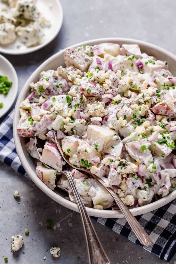 Overhead view of a bowl of Blue Cheese Potato Salad with Chives