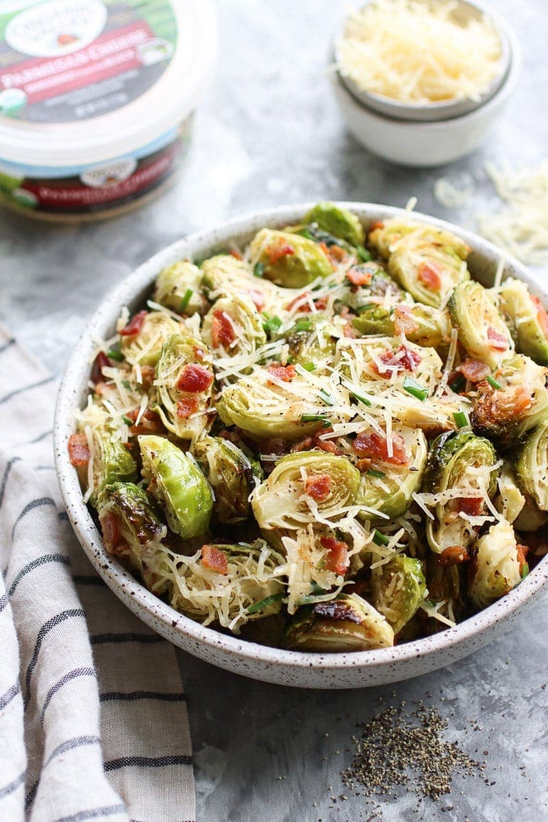 close up view of a bowl of Parmesan Roasted Brussels Sprouts with Bacon