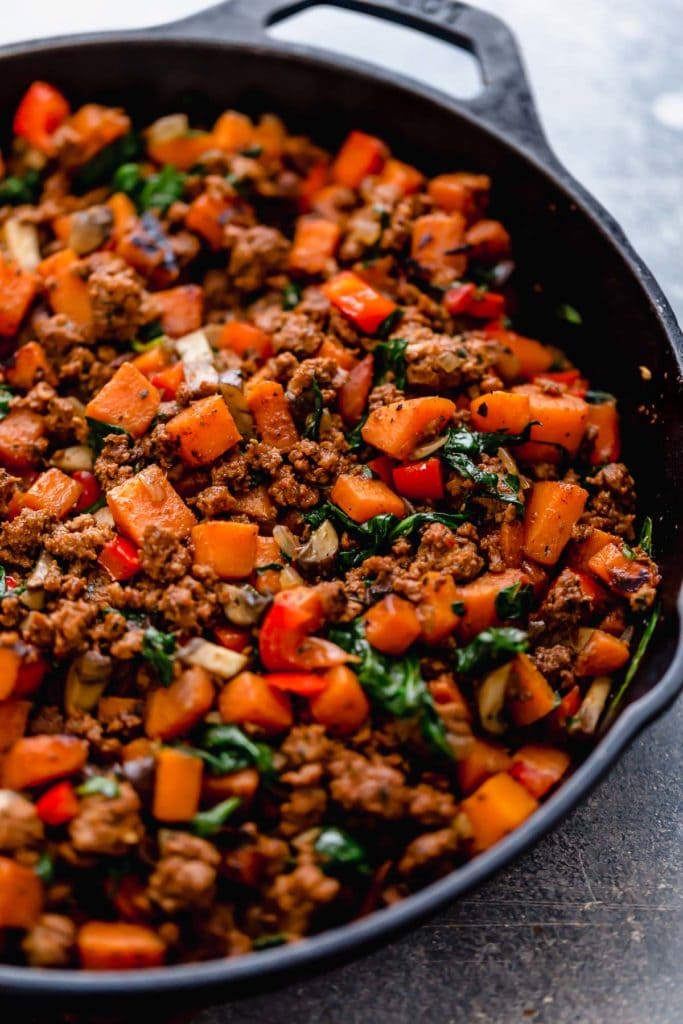 Tex-Mex Sweet Potato Hash in a cast iron skillet.