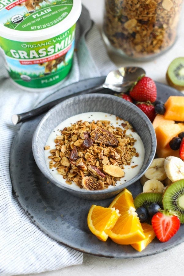 A bowl of yogurt topped with Maple Cinnamon Granola