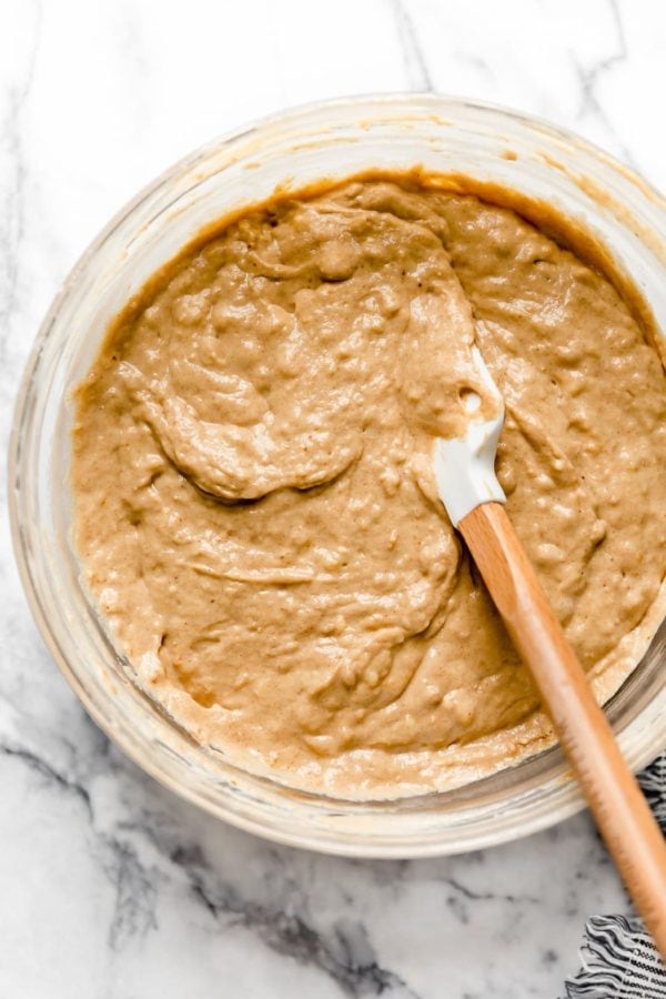Gluten-Free Peanut Butter Banana Waffle batter in a glass bowl