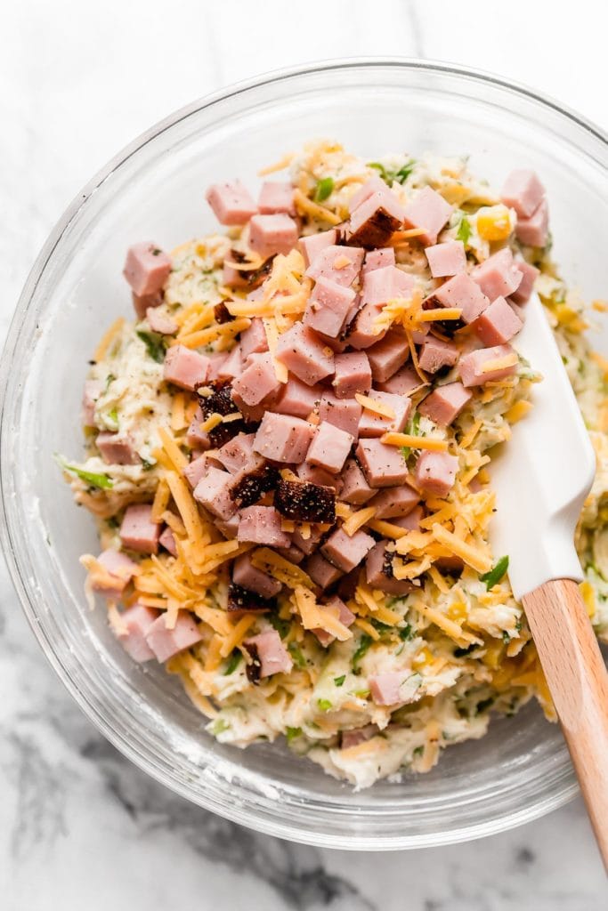 Savory Ham & Cheese Muffins ingredients in a bowl