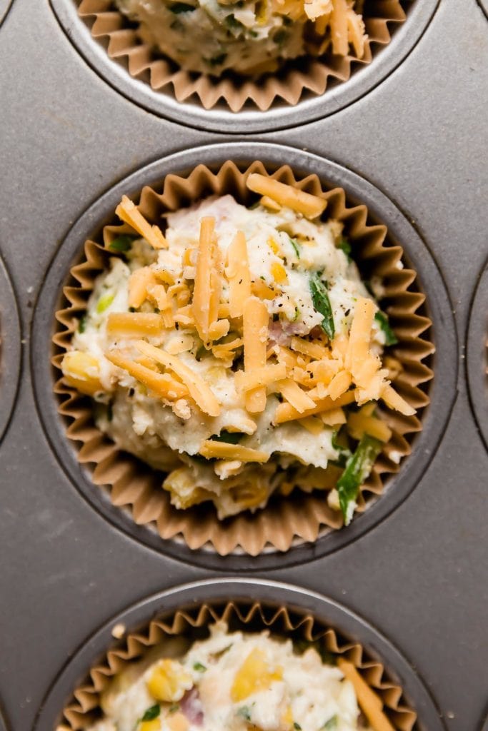 Savory Ham & Cheese Muffins in a muffin tray
