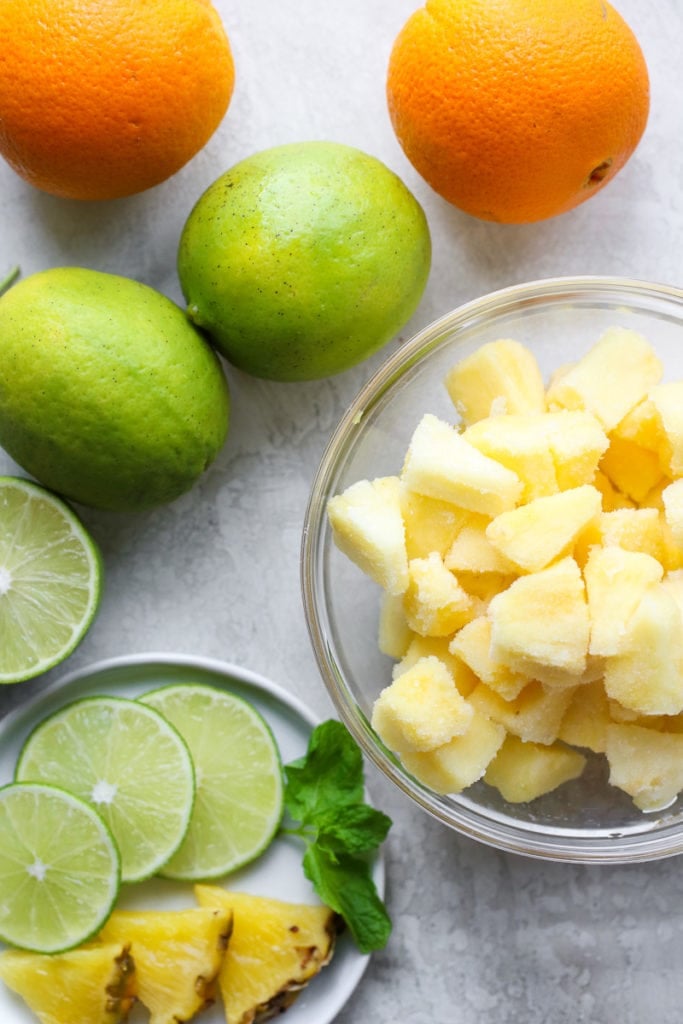 Flat lay showing ingredients for Frozen Pineapple Margaritas