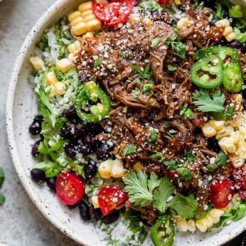 Instant Pot Beef Barbacoa served on a stone plate