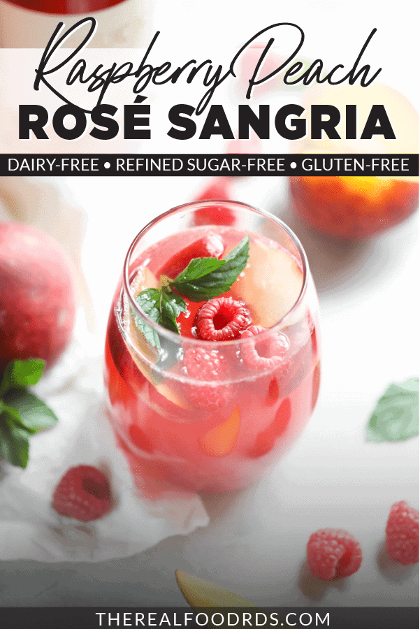 A photo of a Raspberry-Peach Rosé Sangria with text overlay