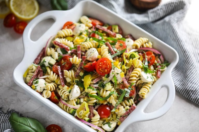 Side view of Zesty Italian Pasta Salad in white serving bowl