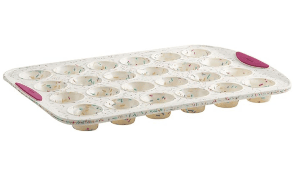 Image of a silicone muffin pan with pink handles