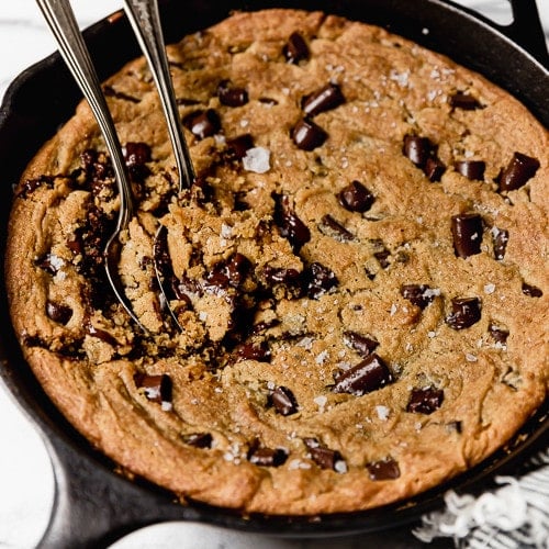 Vegan Chocolate Chip Cookie Skillet sprinkled with sea salt flakes.