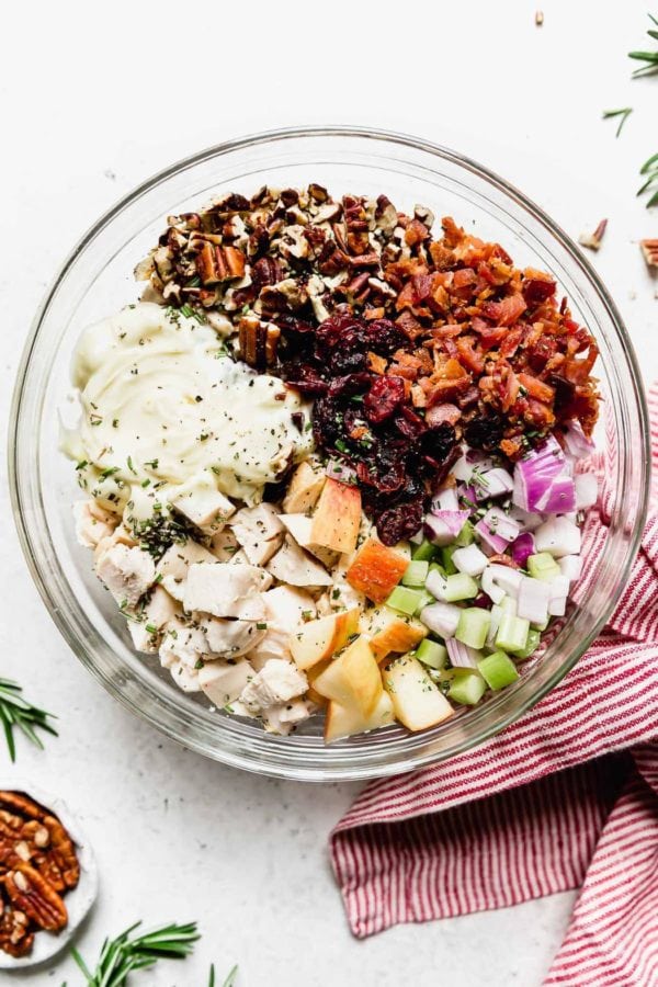 Ingredients for the Cranberry Chicken Salad in a clear bowl before being mixed. 