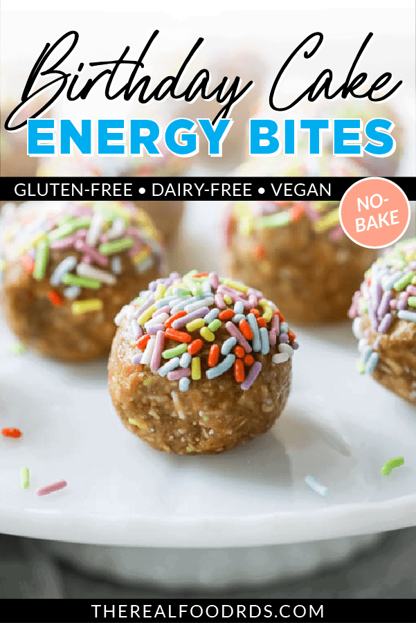 A close up of a birthday cake energy bite topped with colored sprinkles with text overlay of title of recipe