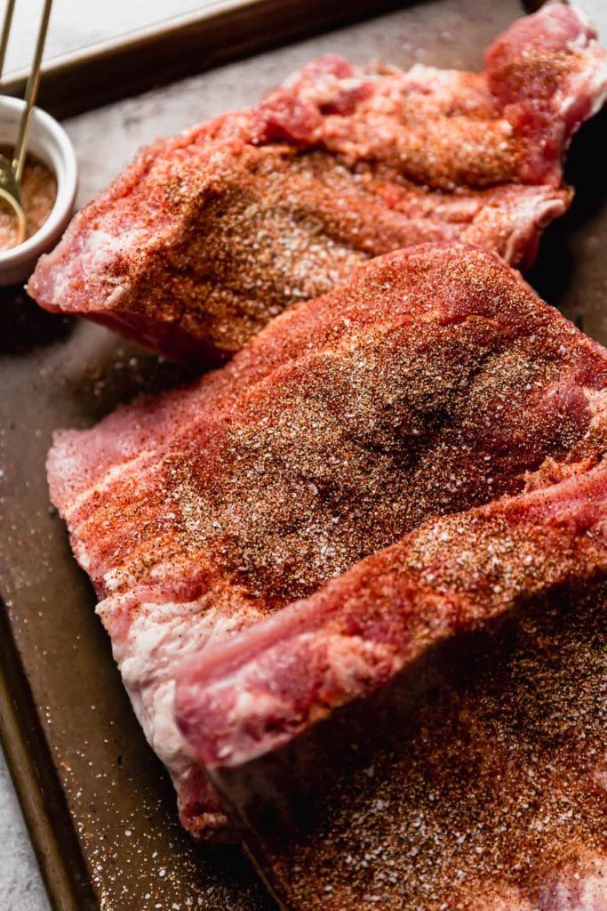 Overhead view of Baby Back Ribs with dry seasonings on top