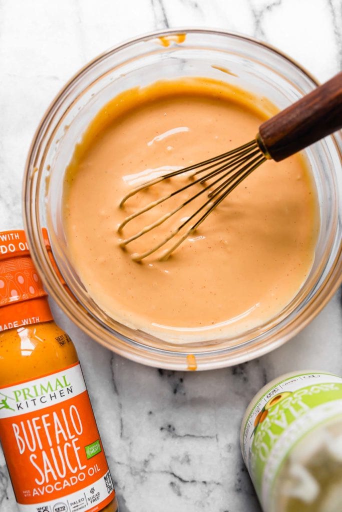 Buffalo sauce mixed with mayo for the Crockpot Buffalo Chicken Dip.