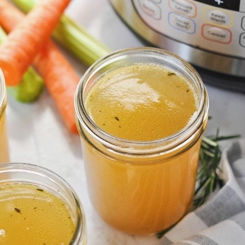 Bone broth in mason jar in front of instant pot