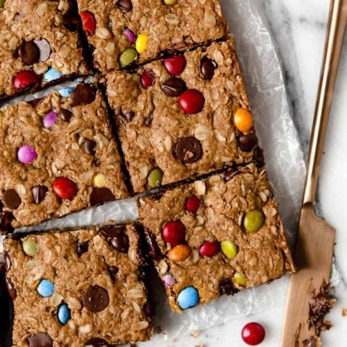 Monster Cookie Bars on parchment paper