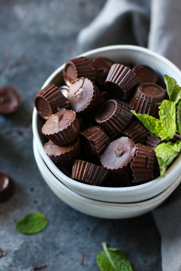 Overhead view of a bowl of dark chocolate mint cups.