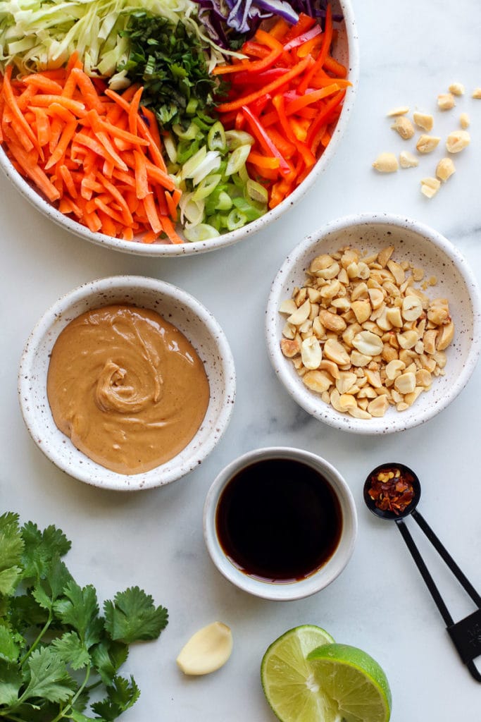 Ingredients for creamy Thai slaw in small bowls