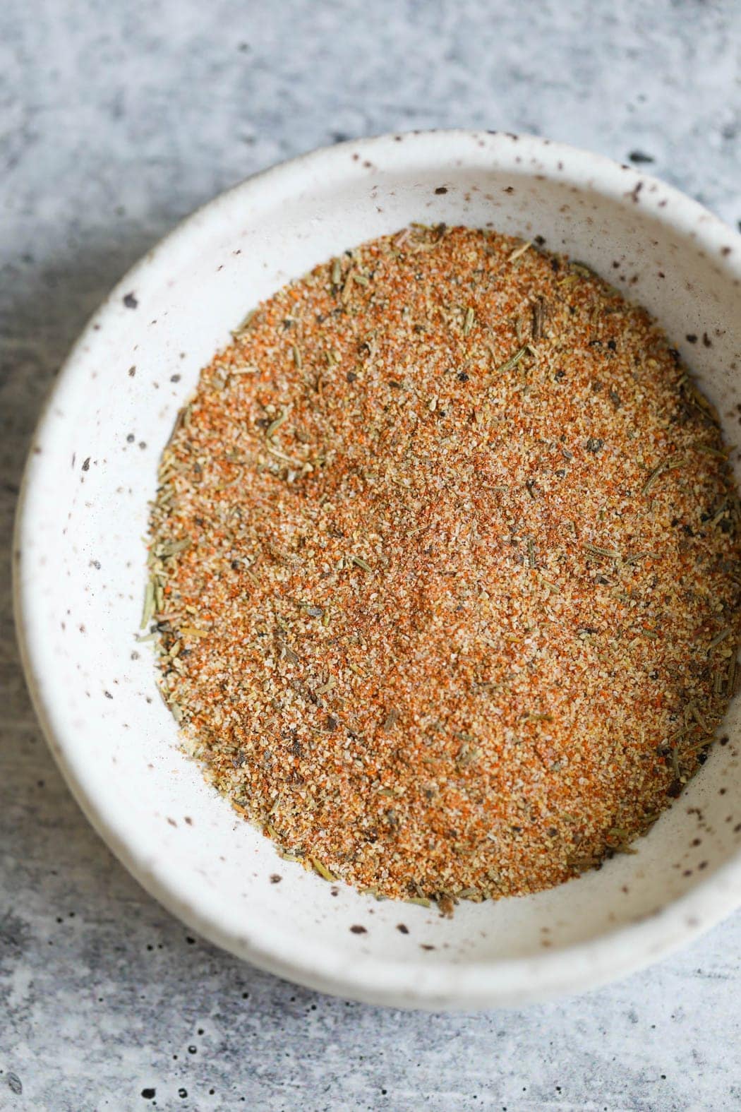 Spiced for smoked spatchcock chicken stirred together in a small bowl