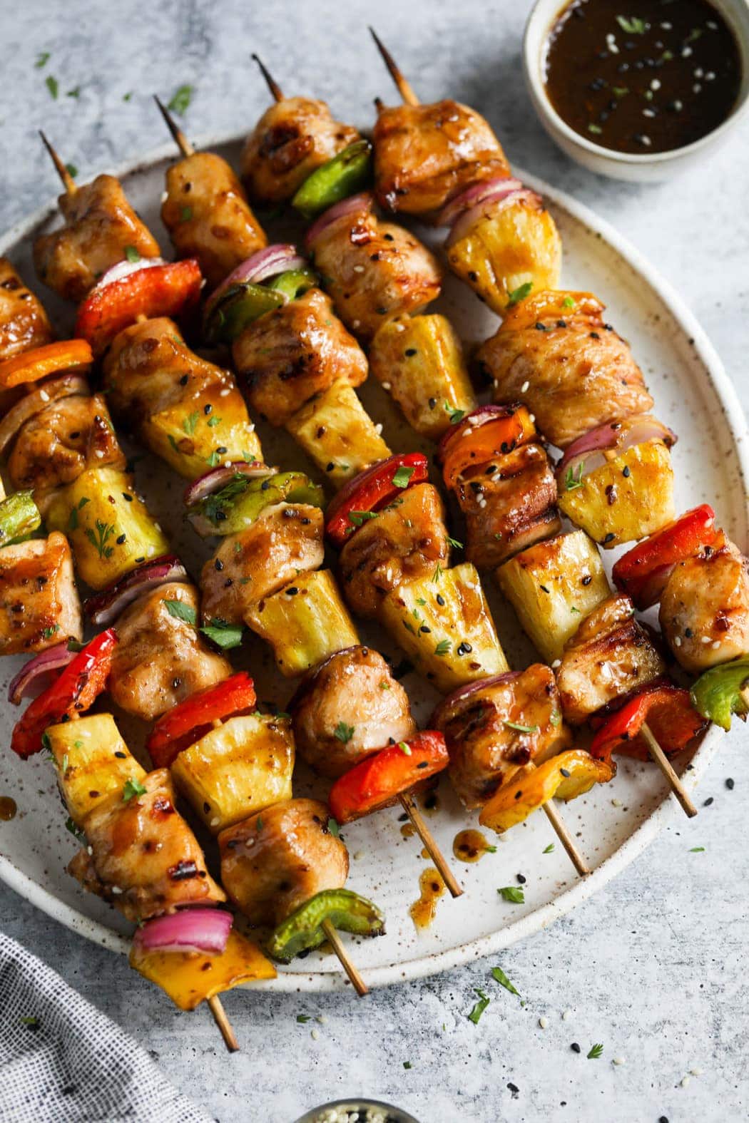 close up view of a plate of Teriyaki Chicken Pineapple Kebabs