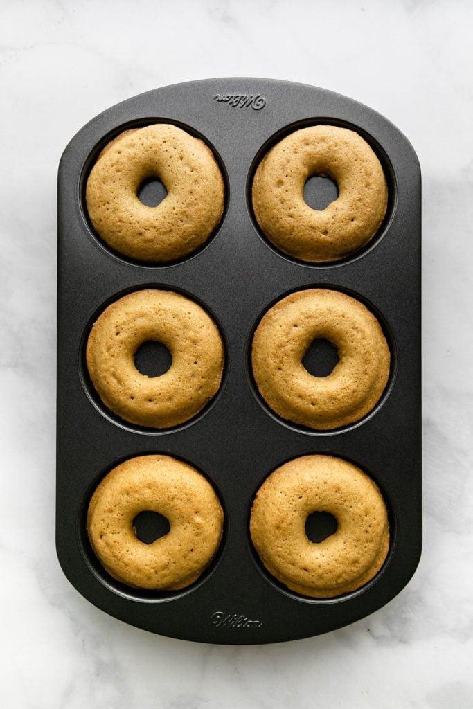 freshly baked Gluten-Free Donuts with Cinnamon and Sugar in a silicone pan
