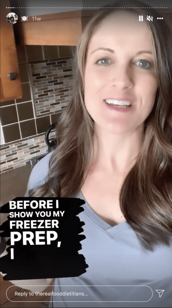 photo of a woman explaining her meal prep in her kitchen