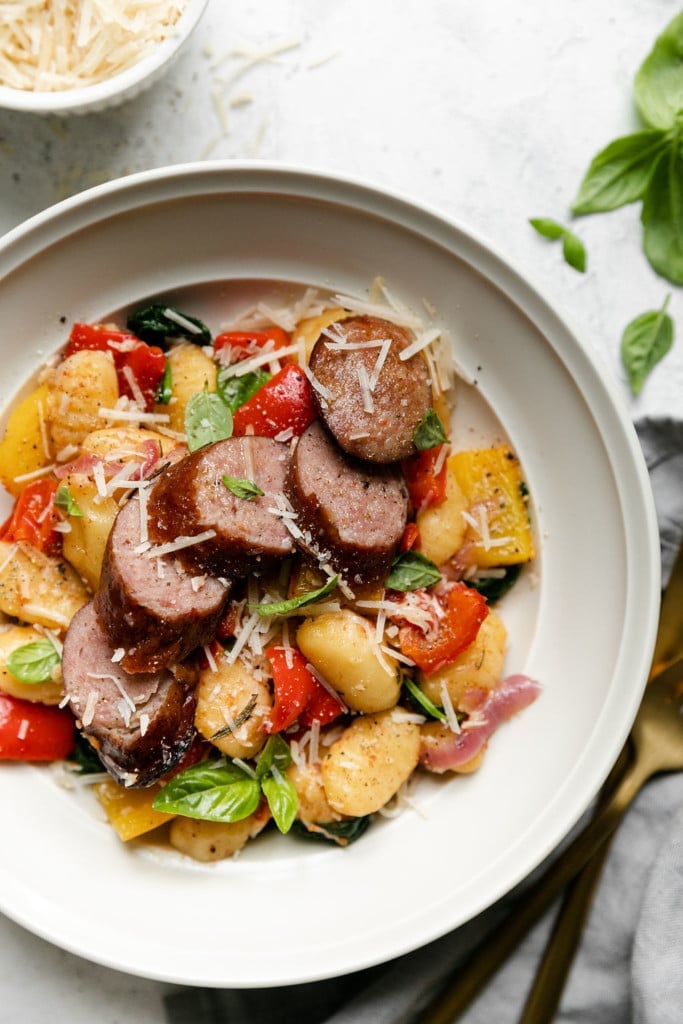 A plate of Sheet Pan Gnocchi with Kielbasa and Vegetables