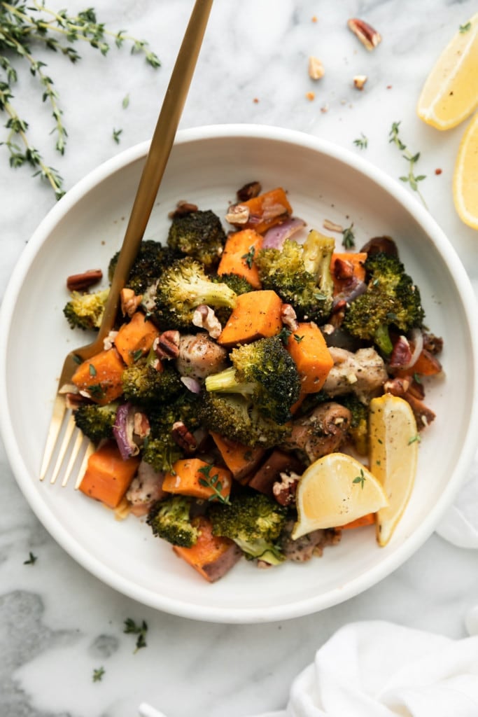 Overhead view of sweet potato chicken broccoli bake plated on a white plate. 